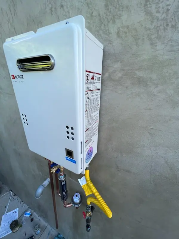 Tankless water heater installation for Battery Marina Village homes